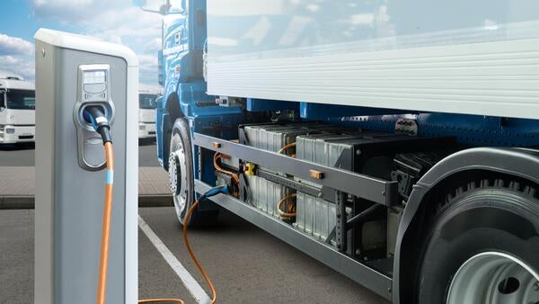 digitally made image of electric truck charging